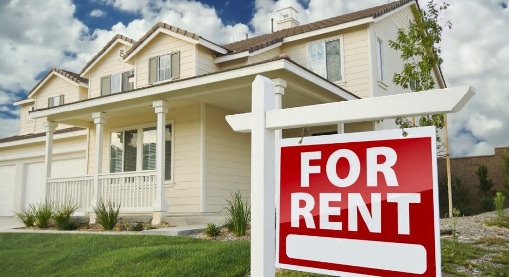 A Red Board outside home showing for rent sign - Houses for rent in Clarksville